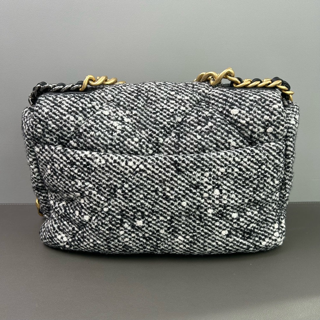 Chanel  Medium Chanel 19 flap bag in tweed quilting, black and white color scheme