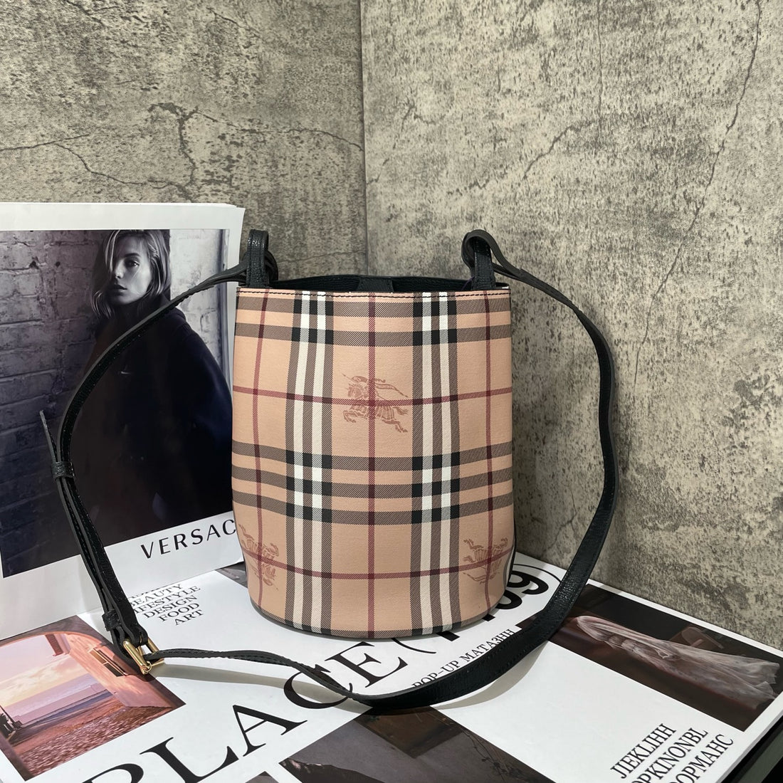 Burberry small Lorne Haymarket check bucket bag.
