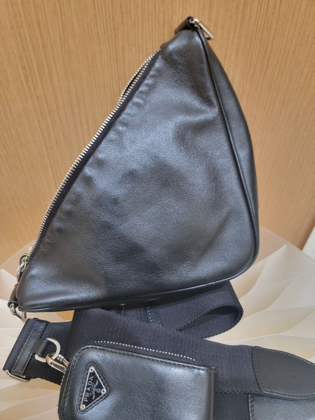 Prada  Triangle Leather Clutch