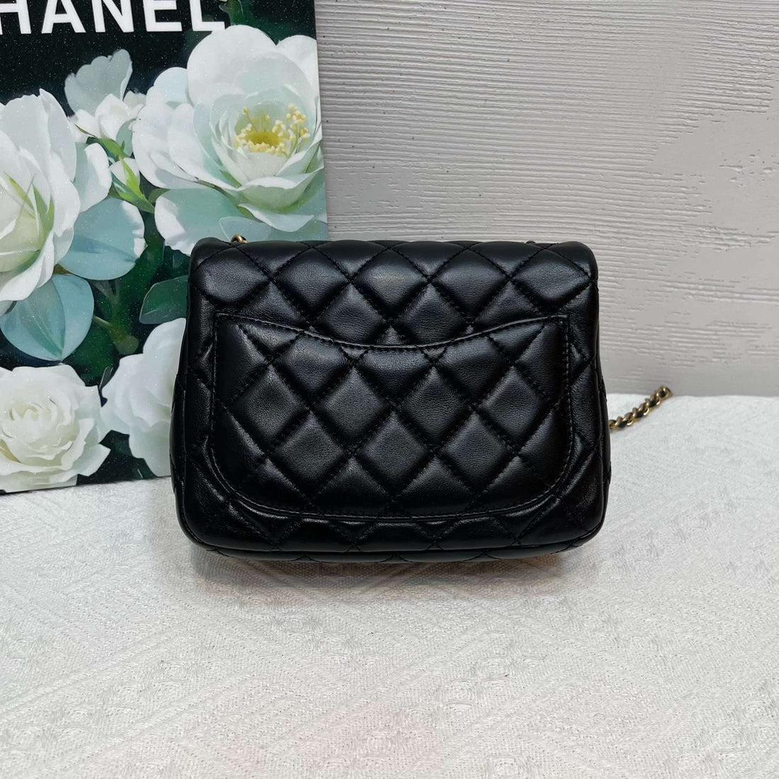 CHANEL Black Lambskin Mini Square Pearl Crush Flap Bag