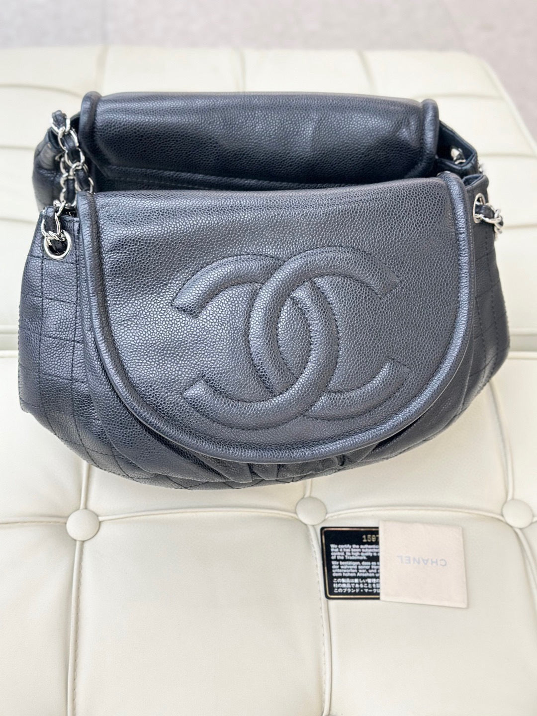 Chanel chain-wrap leather handbag