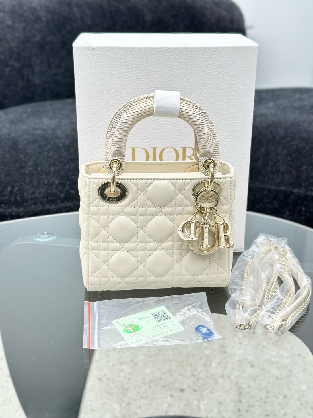 Dior Lady Dior bag with gilded lizard handle, beige lambskin three-compartment design, chain strap