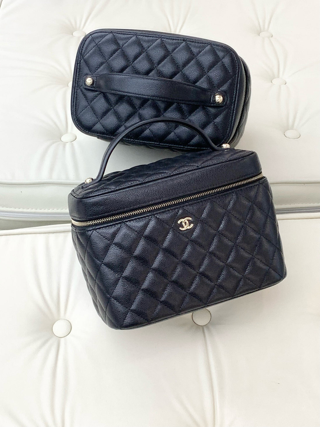 Chanel black caviar cosmetic bag with gold hardware