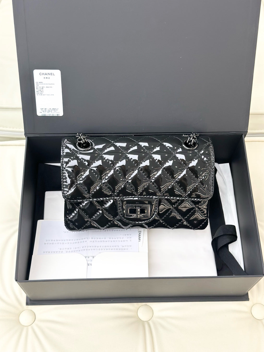 Chanel 22A 2.55m mini black patent leather chain bag