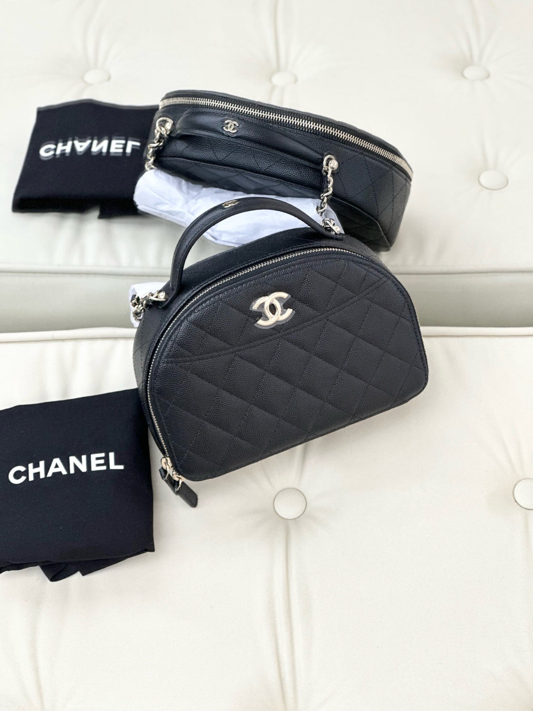 Chanel 25c black caviar leather half-round bowling bag with gold buckle