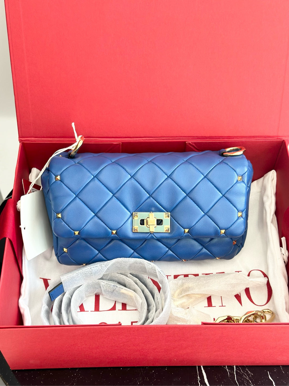 Valentino Garavani crossbody bag, stylish blue crossbody bag.