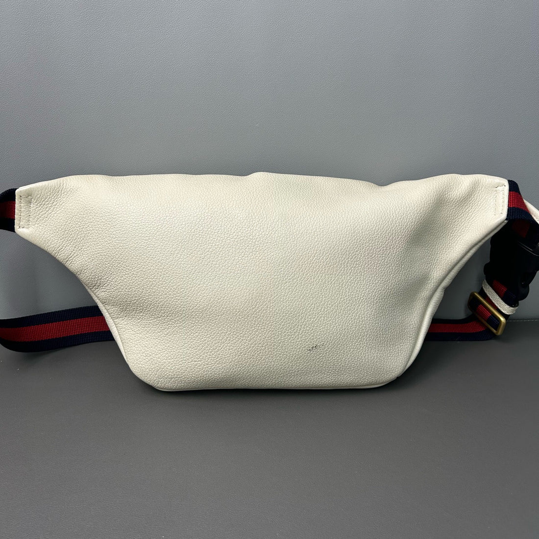 Gucci belt bag with logo on ivory leather webbing